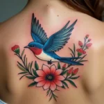 Tatuaż jaskółka: Odkryj jego znaczenie i symbolikę